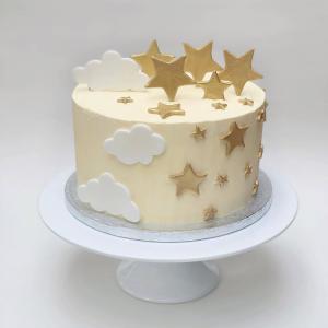 Baby shower cake with fondant gold stars and fondant clouds